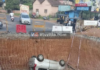 ಉಡುಪಿ: ಮೇಲ್ಲೇತುವೆ ನಿರ್ಮಾಣ ಸ್ಥಳದಿಂದ ಪಿಲ್ಲರ್ ಅಗೆತದ ಗುಂಡಿಗೆ ಕಾರು ಪಲ್ಟಿ